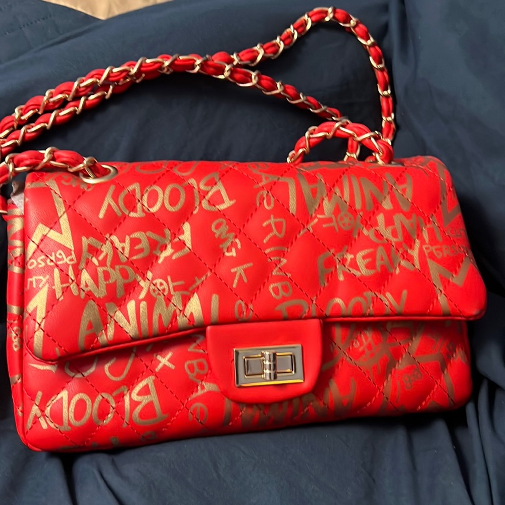 Red and gold graffiti shoulder bag